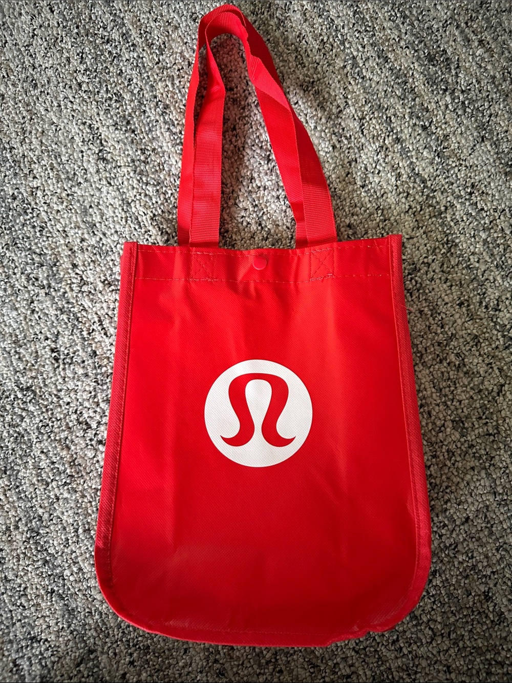 lululemon athletica red tote with white logo